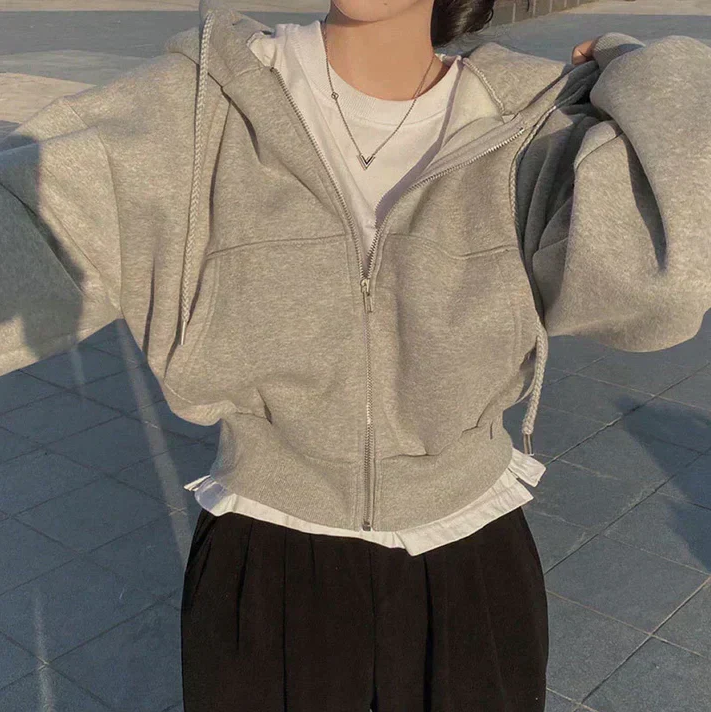 Women oversized zip-up winter jumper cozy soft knitwear sustainable casual silhouette all-day comfort