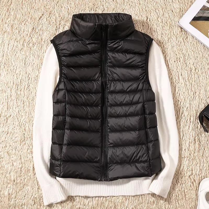 Women's cropped sleeveless down puffer vest lightweight nylon shell for layering outdoor style
