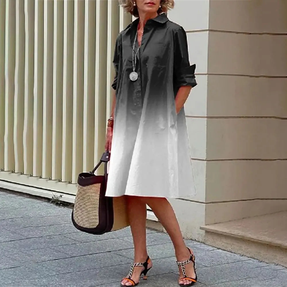 Women's navy blue A-line shirt dress, button-front knee-length silhouette with long sleeves