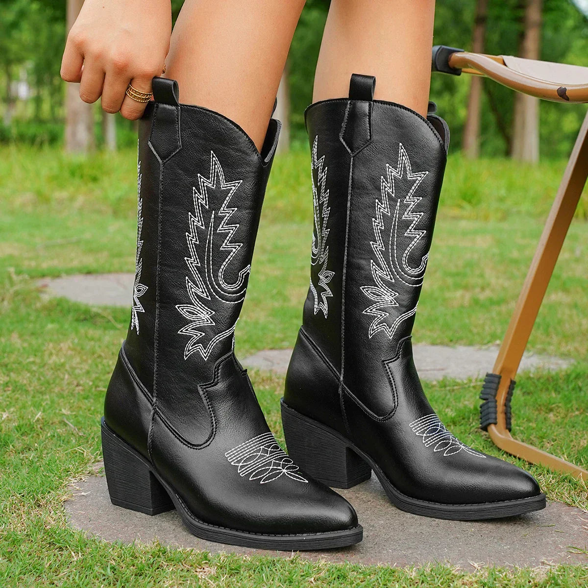 Women's brown leather knee-high boots with Western stitching details and comfortable mid-heel design