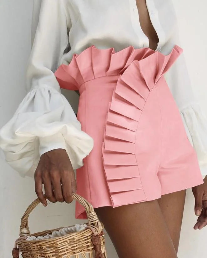 Women's pleated high-waist shorts with cascading ruffles, flattering sculpted silhouette