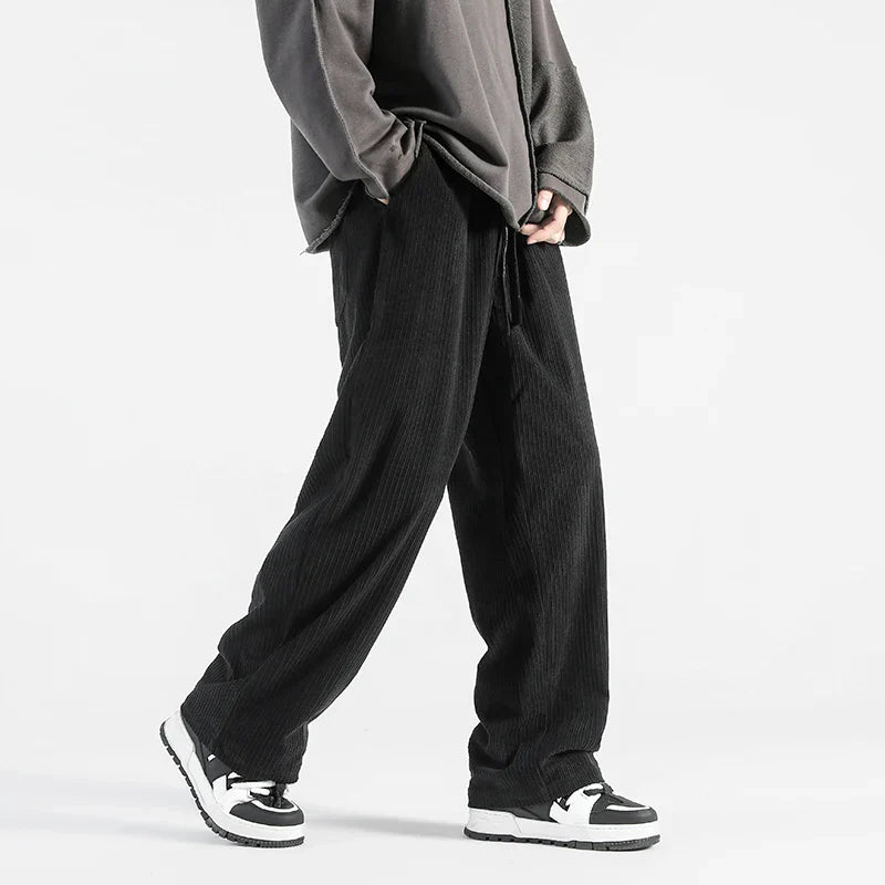 Men's relaxed straight fit corduroy pants with elastic waistband, soft ribbed texture, casual style