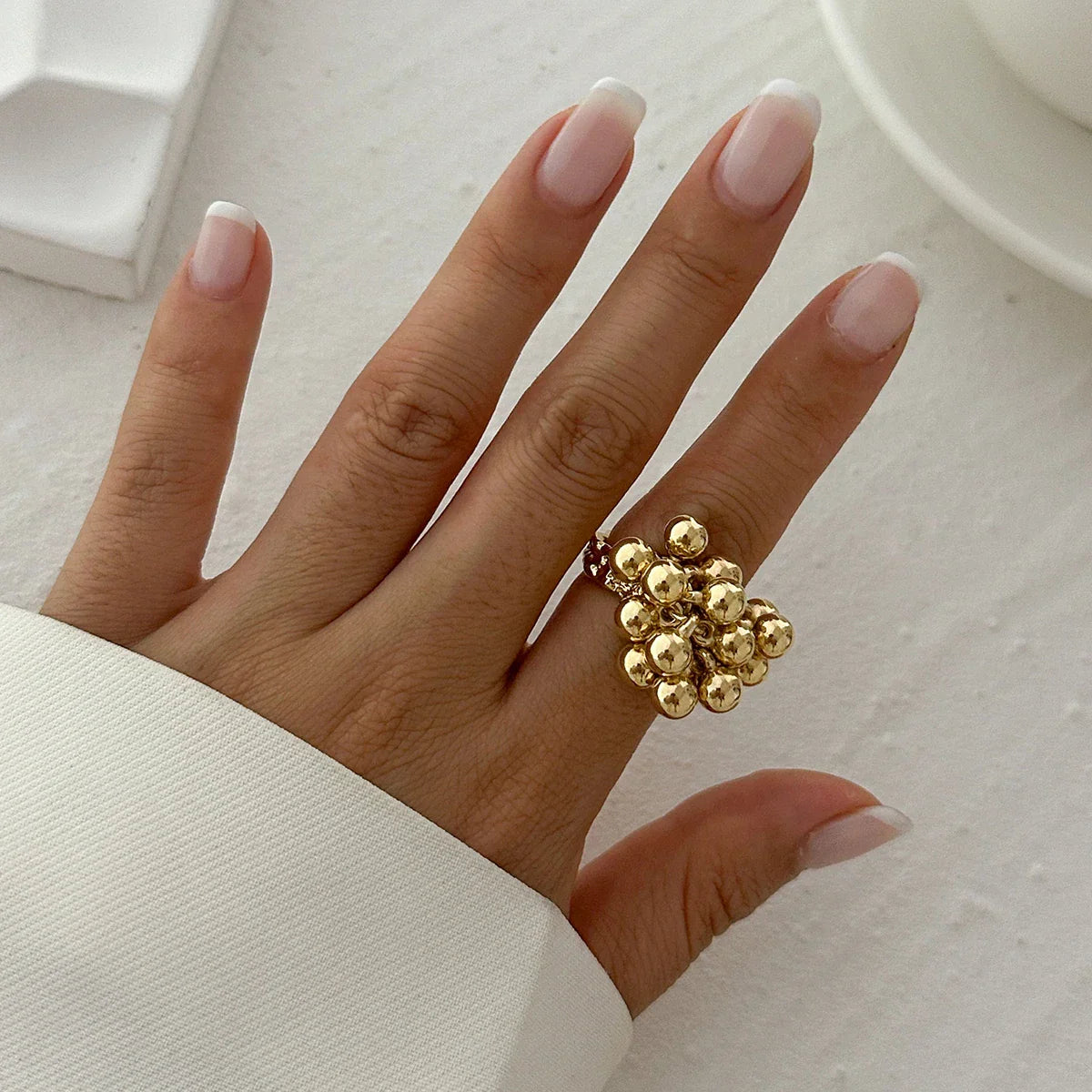 Adjustable open gold statement ring with jiggling ball charm, women's playful jewelry gift