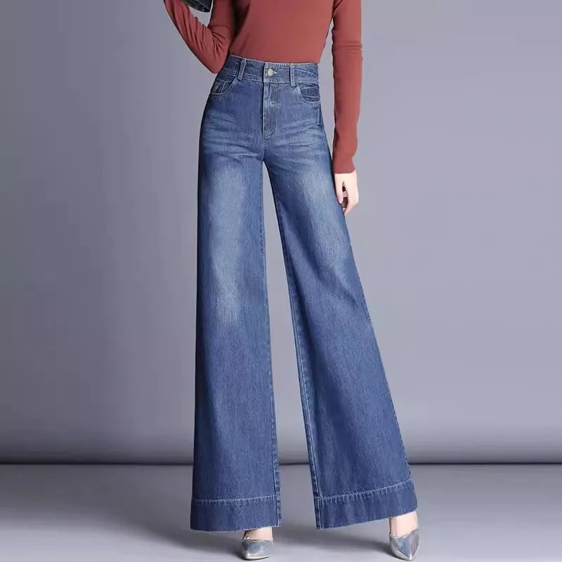 Women's blue high-waist flared denim jeans with cinched fit and stretch comfort for all-day wear