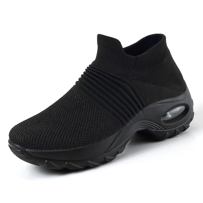 Women's black mesh platform sneakers with breathable knit upper and bold cushioned sole for gym
