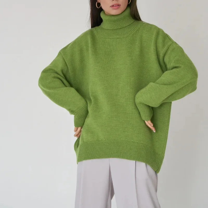Women's oversized cream ribbed turtleneck sweater with soft knit blend and folded collar