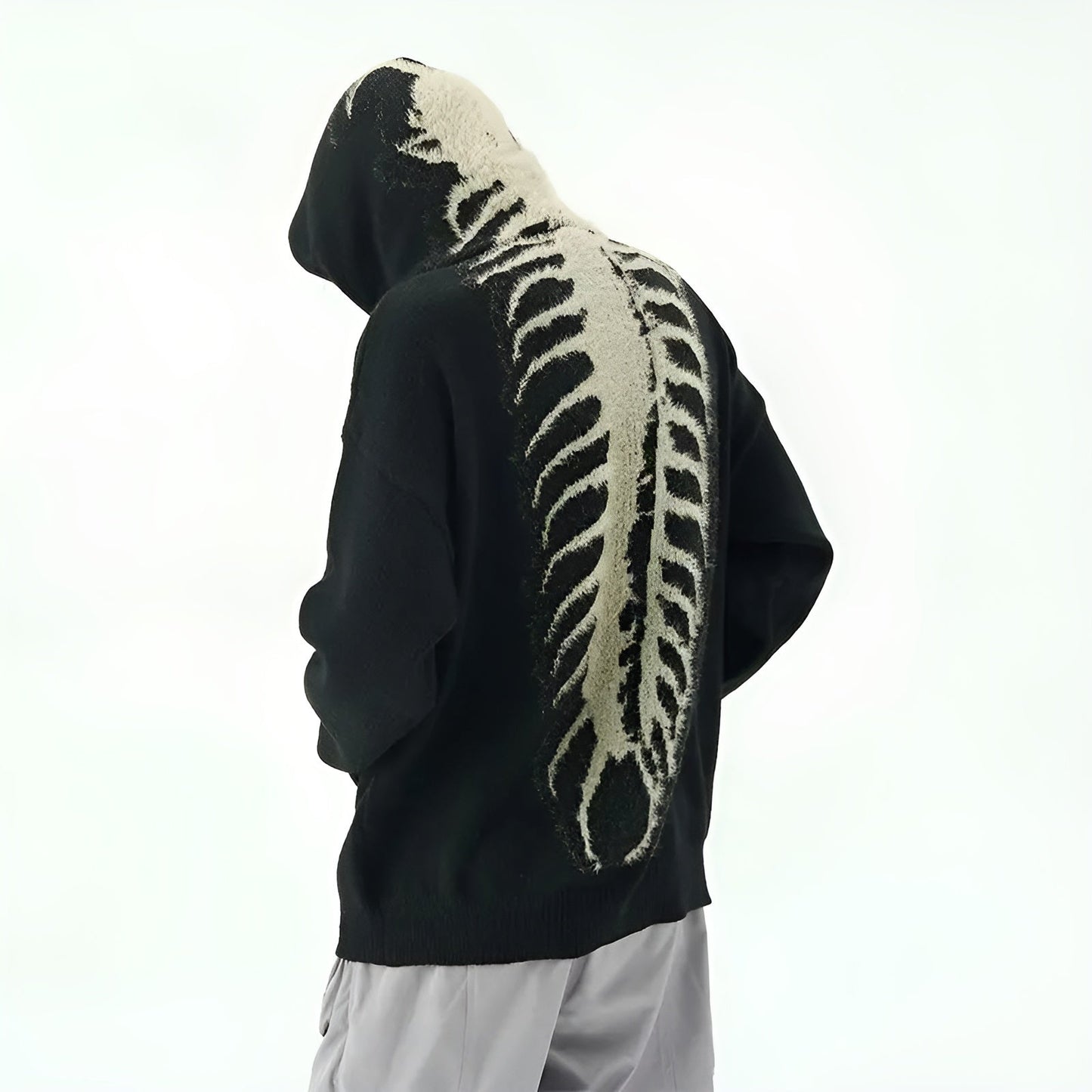 Anthracite knit hoodie with oversized centipede spine motif bold grunge streetwear style