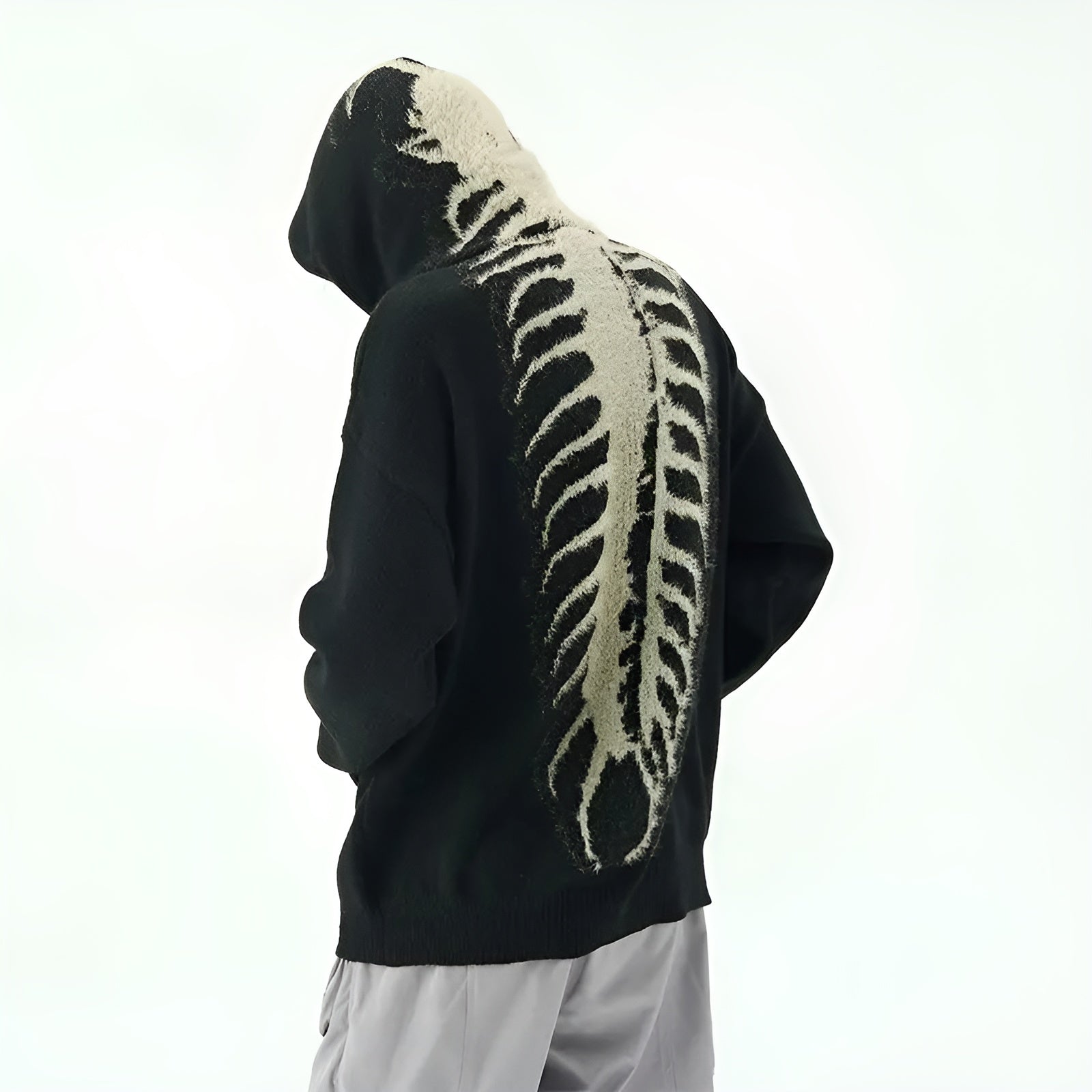 Anthracite knit hoodie with oversized centipede spine motif bold grunge streetwear style