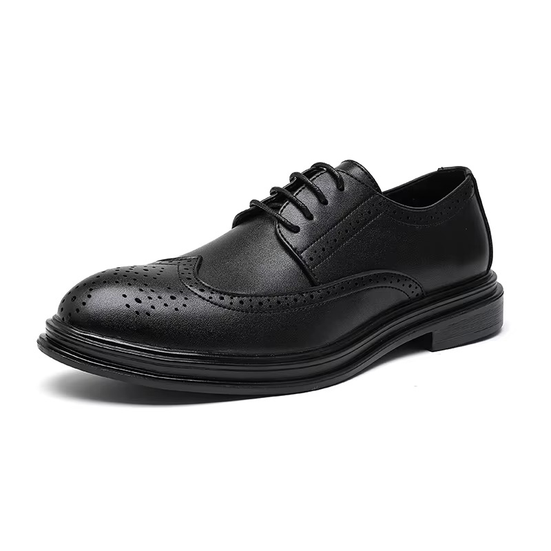 Men's classic brown lace-up brogue shoes with wingtip accents and intricate perforations