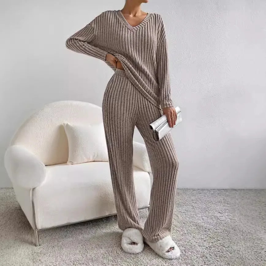 Women's ribbed two-piece lounge set with matching sweater and pants in cozy relaxed-fit style