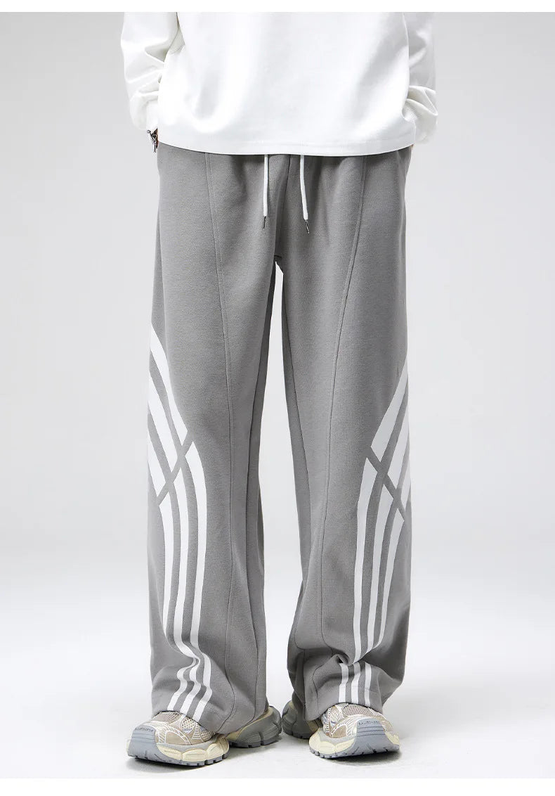 Gray straight fit sweatpants with vintage wraparound stripe, wide flared leg for streetwear stacking