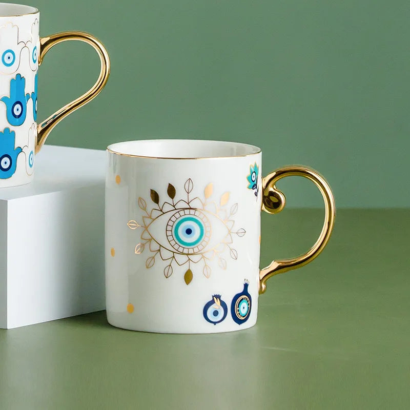 Evil Eye ceramic coffee mug gold trim Turkish craft protection positivity symbol design