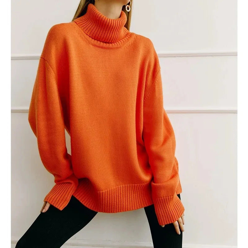 Women's oversized ribbed turtleneck sweater in soft knit blend with folded collar detail