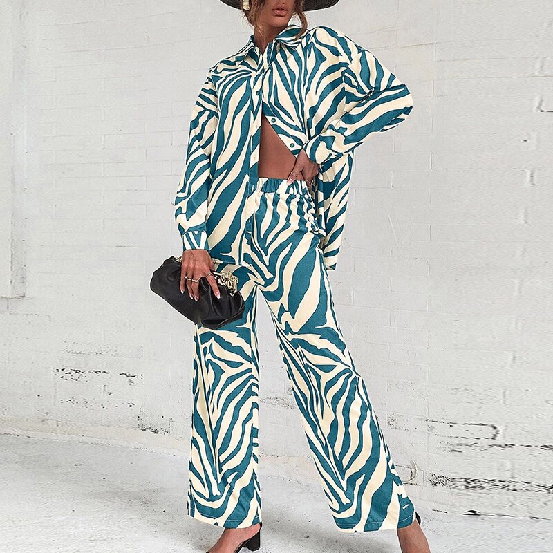Women's two-piece blouse set elegant long top with vibrant abstract printed matching pants modern chic