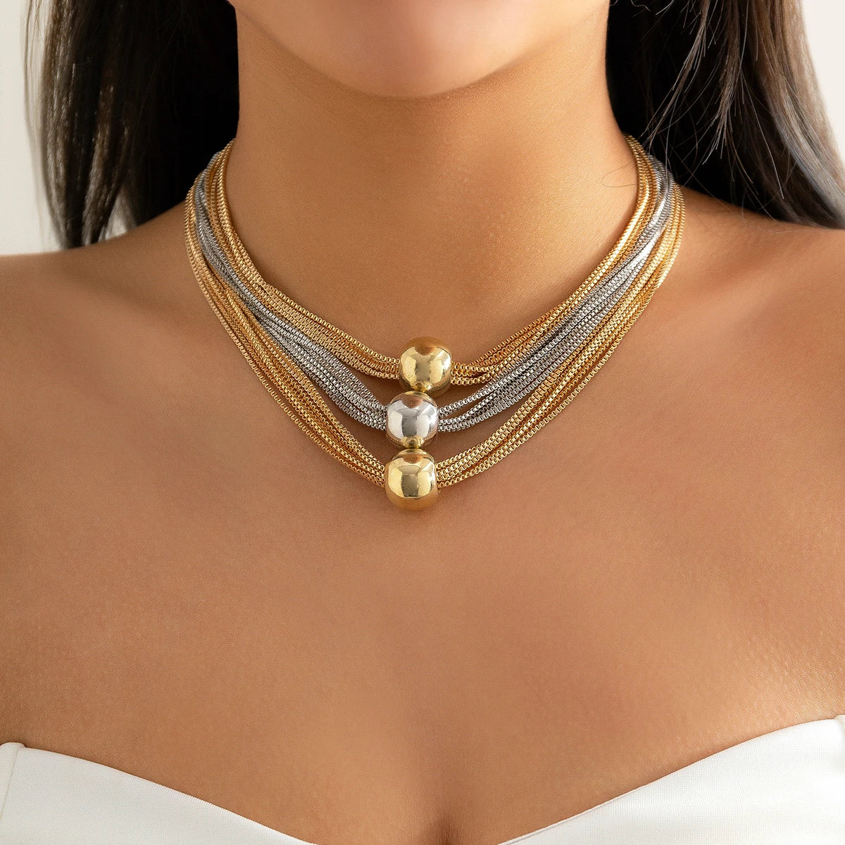 Nocturne three-tier layered gold ball drape necklace vintage-inspired delicate cascading chains elegance