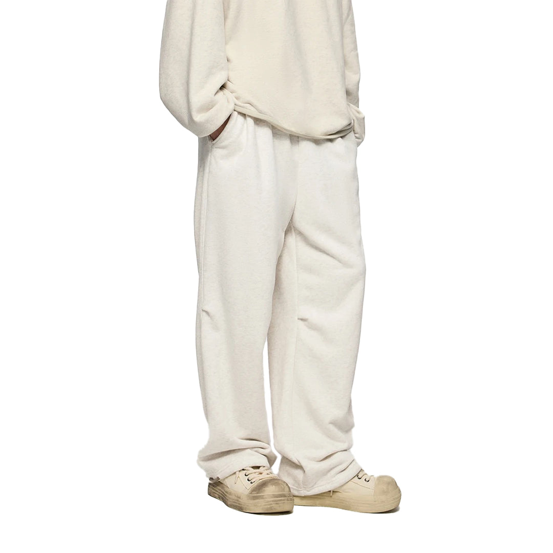 Men's relaxed-fit heavyweight cotton sweatpants in neutral tone with refined drawstring waist
