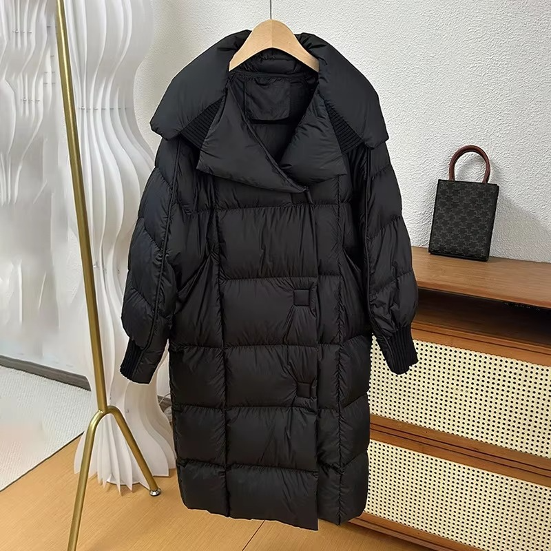 Women's long oversized down coat winter outerwear with premium white duck down fill for cozy warmth