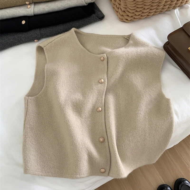 Women's cozy plush yarn knit sleeveless vest with button-front closure, versatile layering piece