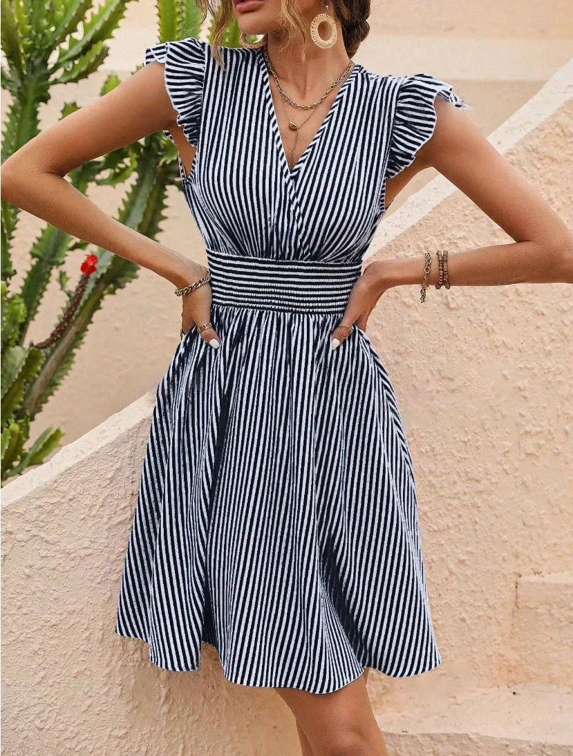 Women's striped knee-length summer dress with butterfly sleeves, smocked waist, and breezy lightweight fabric