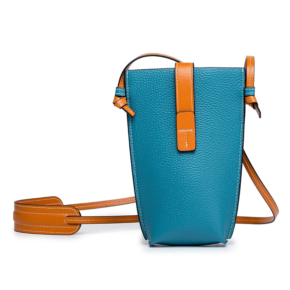 Women's compact vertical crossbody bag in vegan PU leather with adjustable strap for on-the-go style