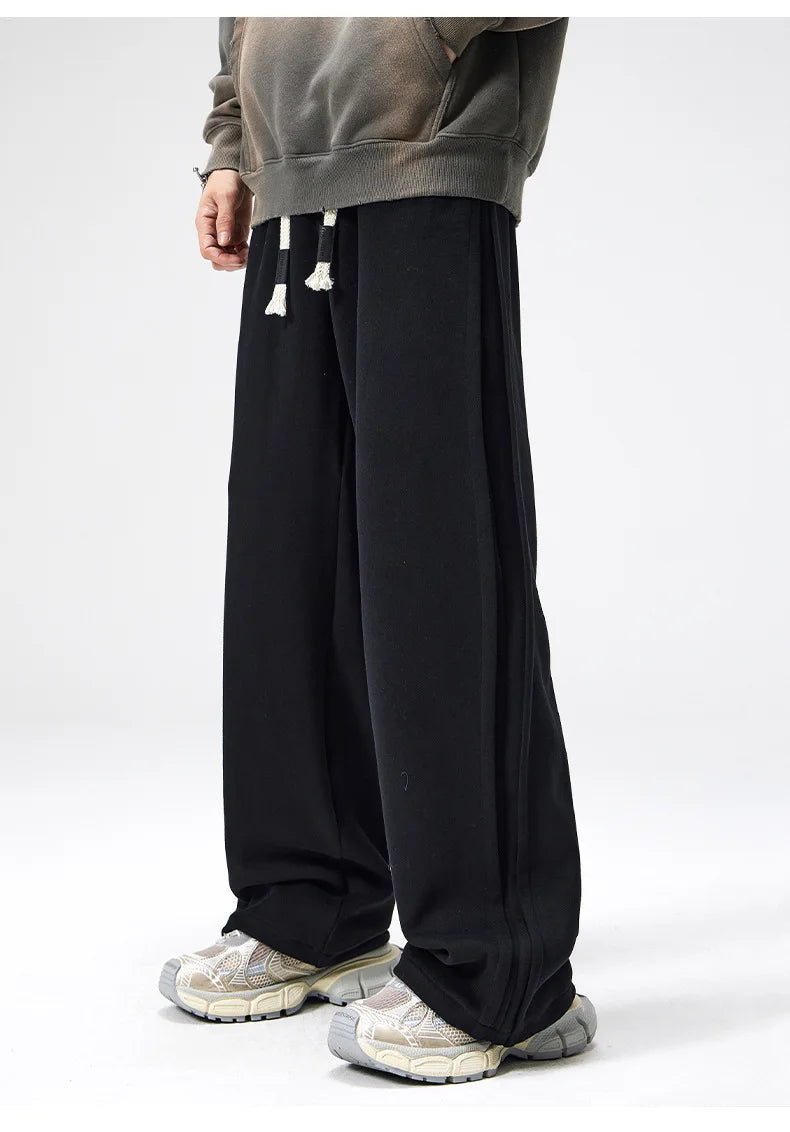 Unisex relaxed-fit cotton blend sweatpants with hemmed bottoms for lounge-to-street wear