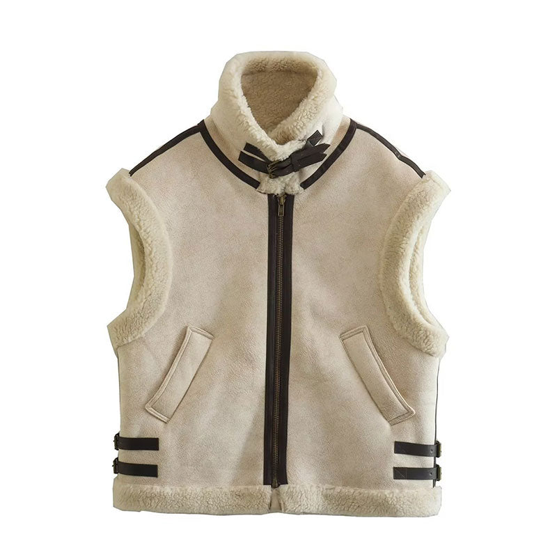 Women's shearling vest with cozy faux fur lining, vintage-inspired detailing, relaxed winter layering style