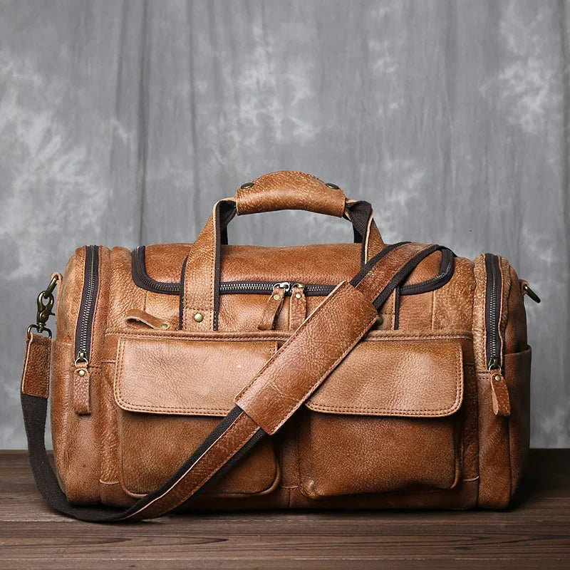 Premium brown leather structured barrel duffel bag unisex travel carry-on with timeless elegant design