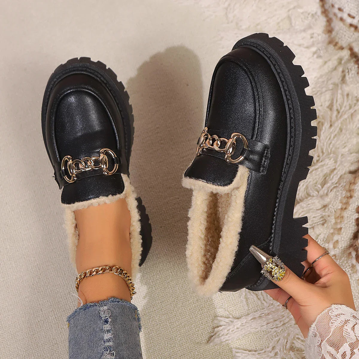 Women's sherpa-lined platform loafer in faux leather with plush cozy interior and chunky sole
