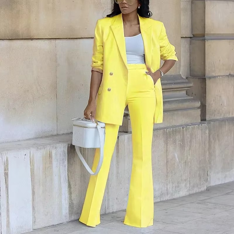 Women's elegant black buttoned blazer and flared pants two-piece set for work to evening