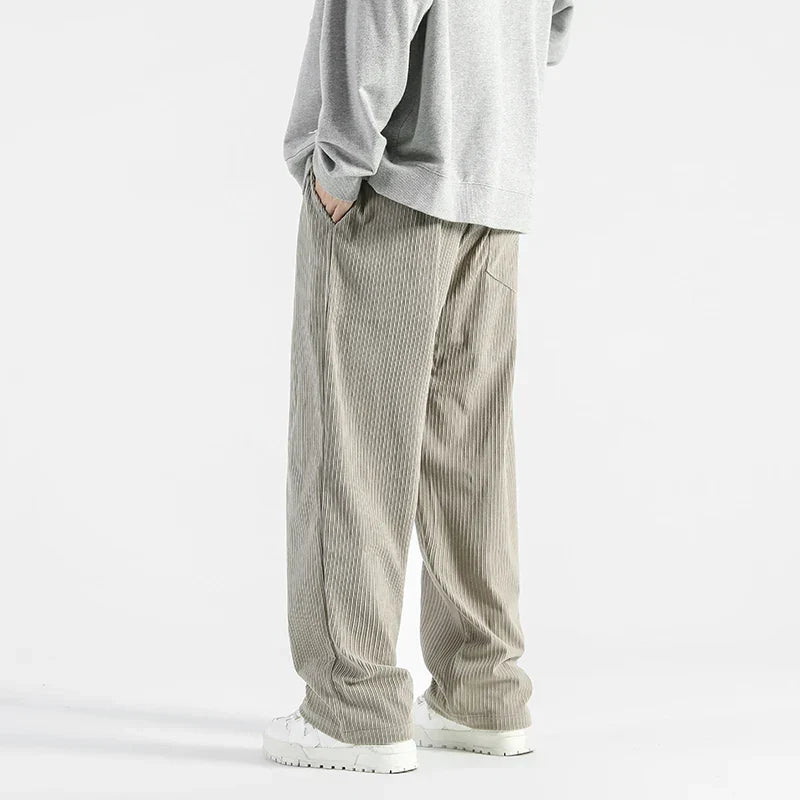 Men's relaxed straight fit corduroy pants with elastic waistband, soft ribbed texture, casual style