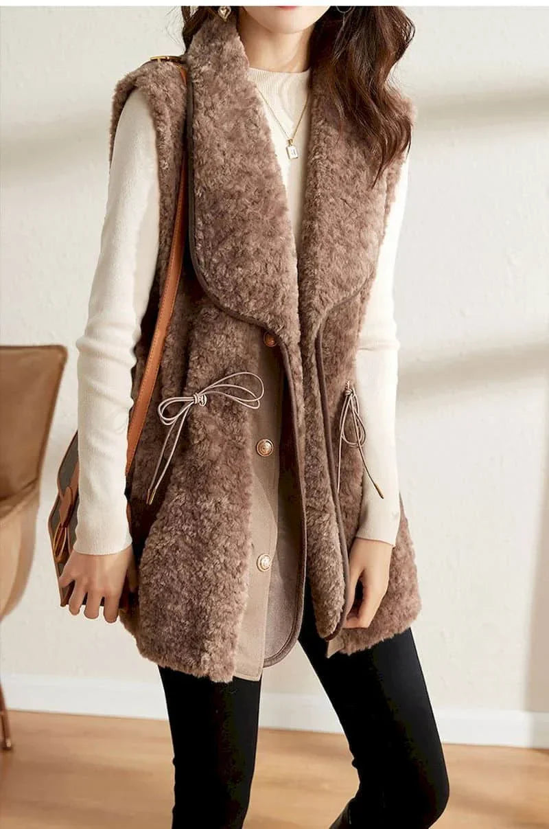 Women's plush wool vest in neutral tone, wide collar silhouette with elegant gold button fastening