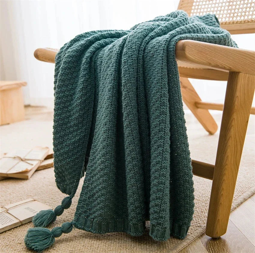 Ultra-soft handknit Nordic throw blanket with tassel fringe, cozy chunky knit style for beds and couches
