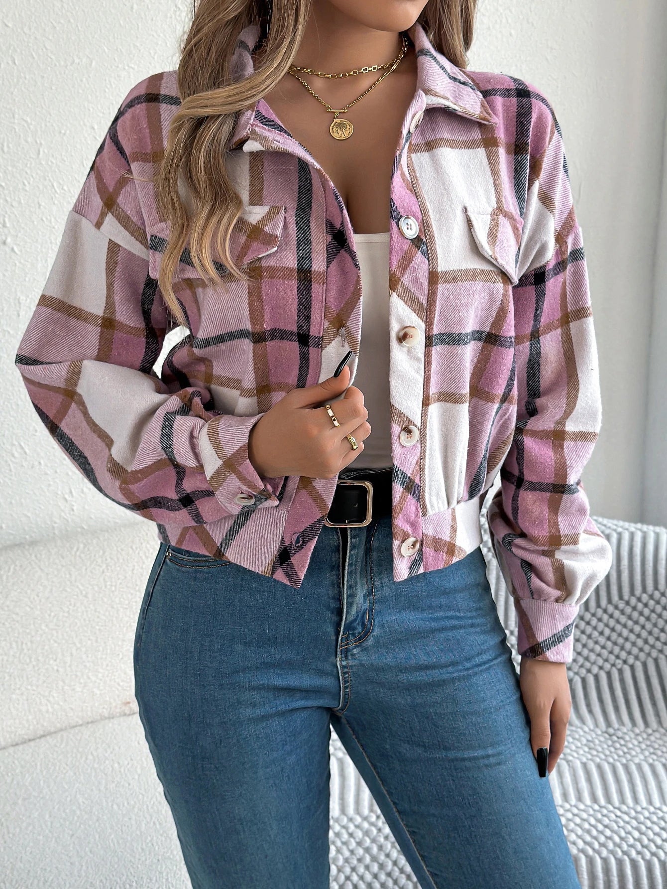 Women's cropped plaid jacket in warm tones, waist-length silhouette with cozy brushed fabric bold pattern