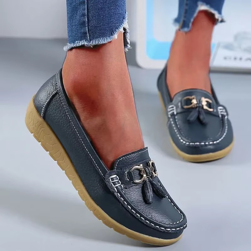 Black genuine leather women's slip-on moccasin flats with all-day comfort sole for everyday style