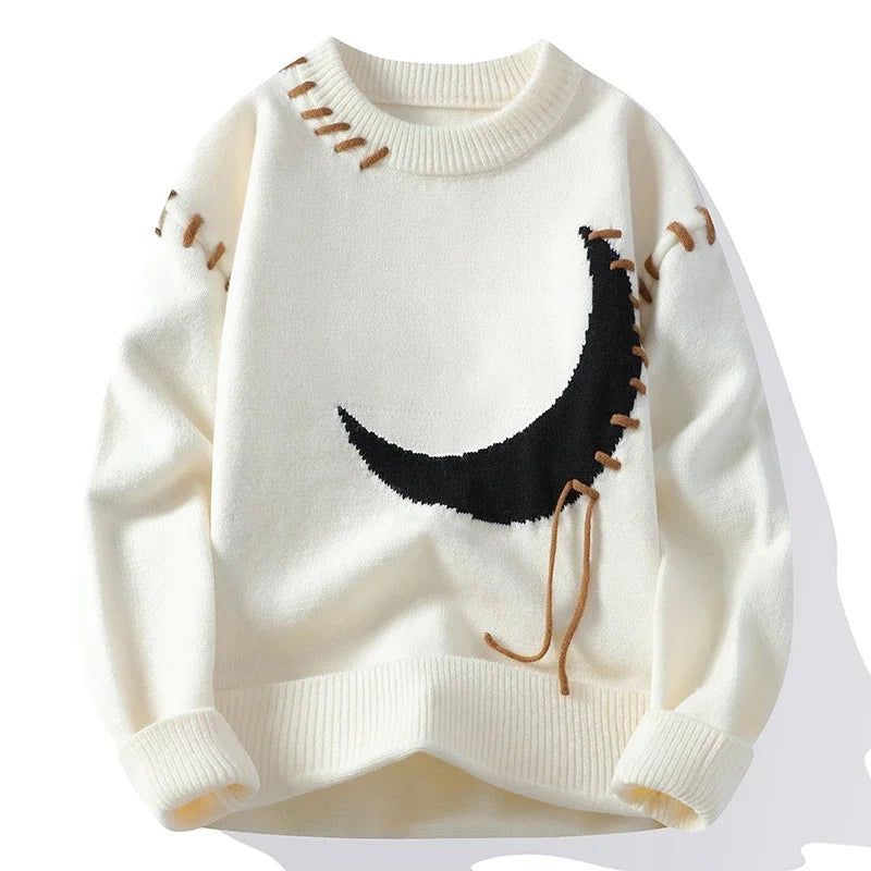 Women's cream knit crew neck sweater with crescent moon graphic and textured stitch detailing