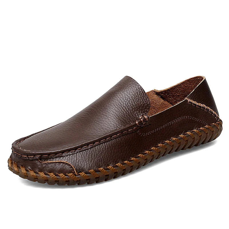 Men's brown leather moc toe loafers with braided trim detail, classic slip-on style