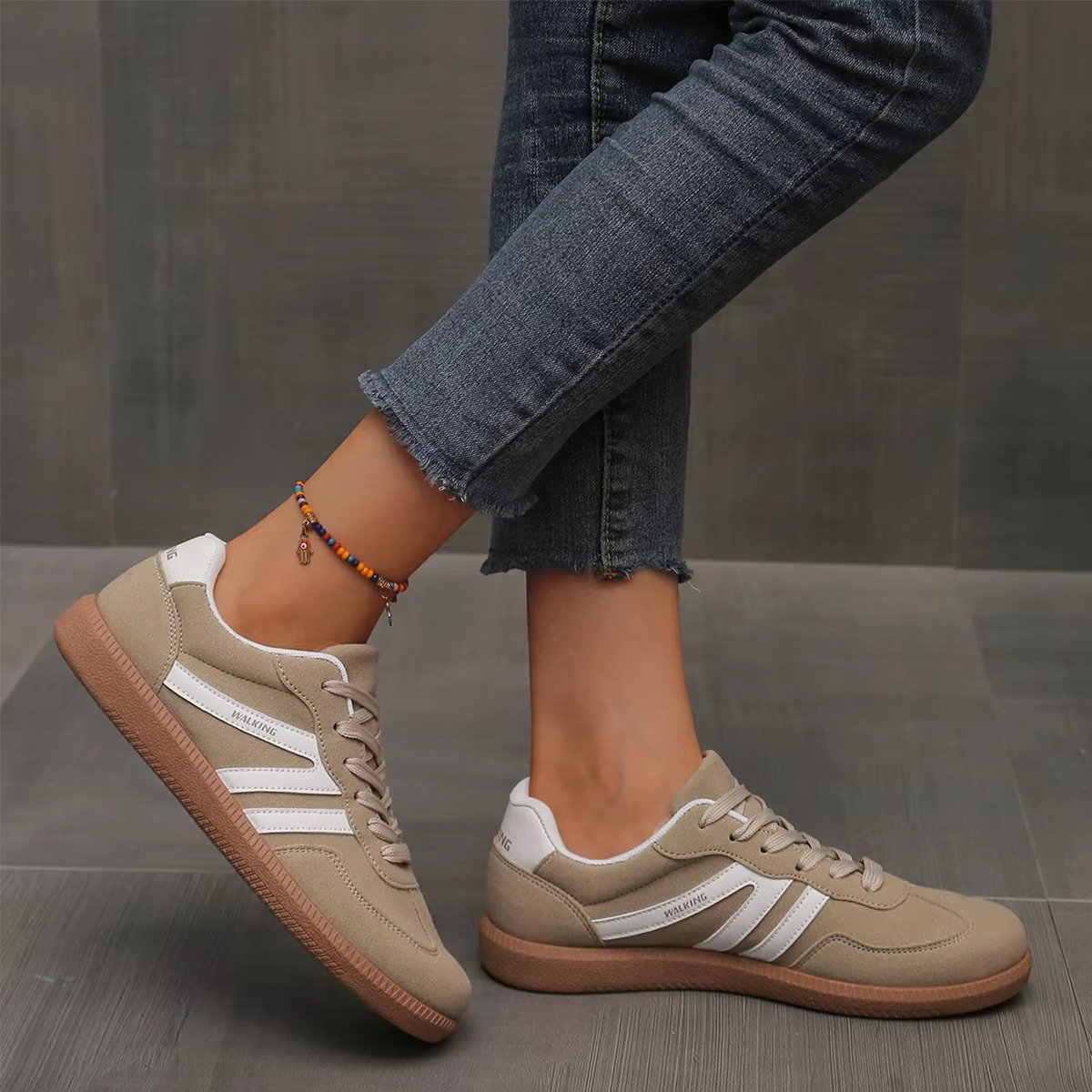 Women's slip-on sneakers in neutral woven textile, lightweight flat sole for effortless everyday style