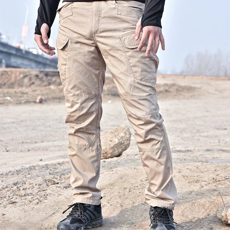 Men's black tactical maxi pants rugged slim-fit silhouette with stretch fabric for outdoor workwear