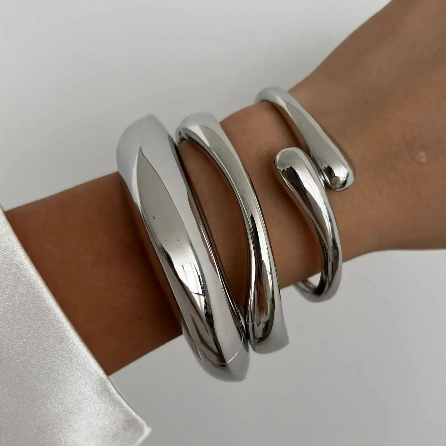 Orvella vintage 3-piece bracelet set molten fluid sculptural design polished light-catching shine bold elegance