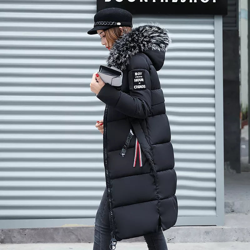 Women's long winter coat with fur collar, tailored full-length silhouette in sleek sustainable style