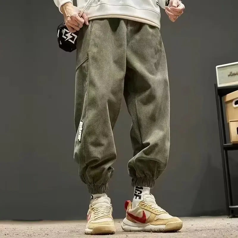 Men's taupe corduroy joggers tailored fit with elastic cuffs dressed-up streetwear style