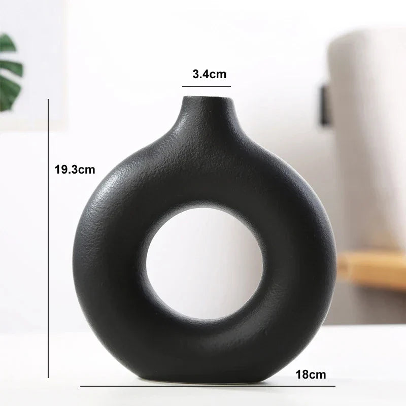 Stone-textured ceramic circular vase in natural calming tones, minimalist home decor accent