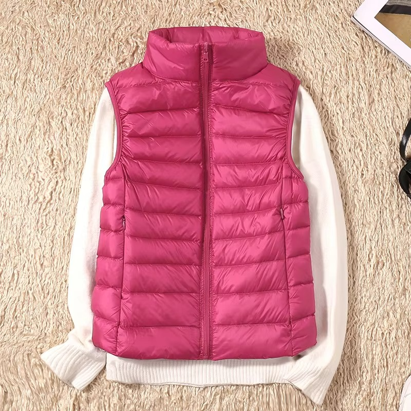 Women's cropped sleeveless down puffer vest lightweight nylon shell for layering outdoor style