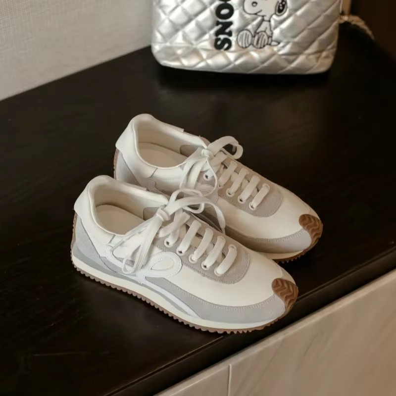 Women's retro color block platform sneakers in bold multicolor with cushioned sole and vintage-inspired design