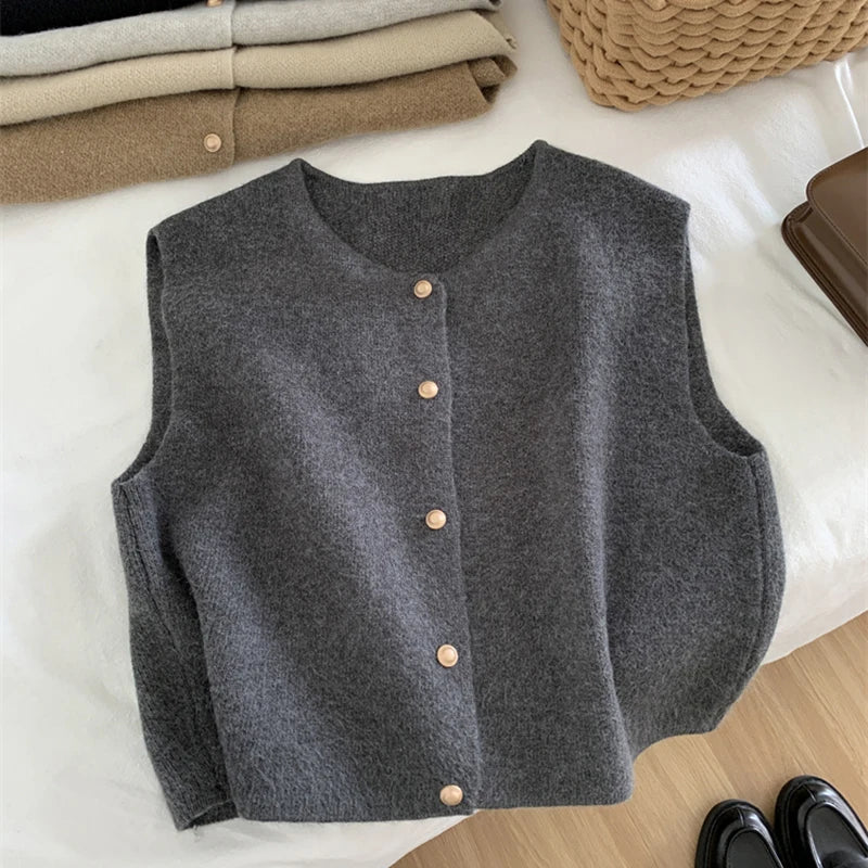 Women's cozy plush yarn knit sleeveless vest with button front, versatile layering piece