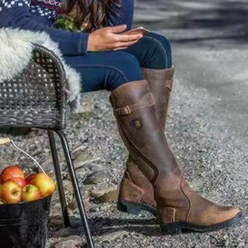 Women's black PU leather knee-high retro boots with buckle detail, side zipper, and round toe