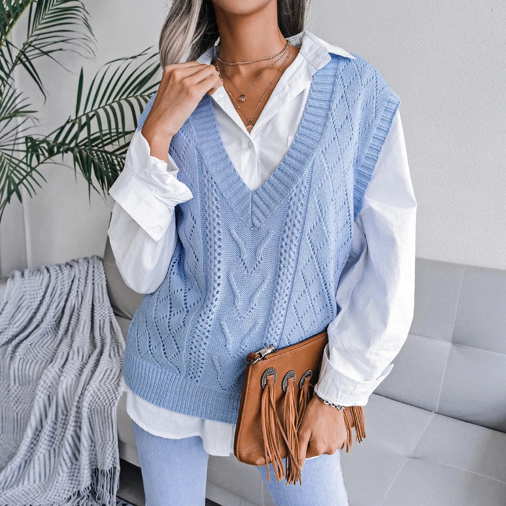 Women's ivory cable-knit wool vest tailored silhouette with intricate texture pattern