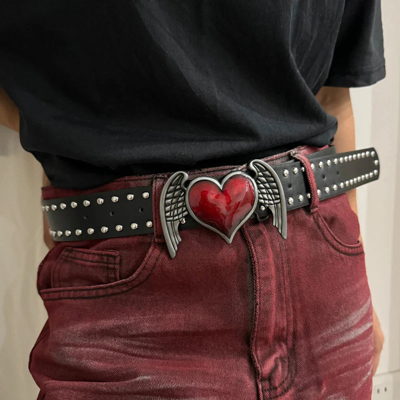 Unisex studded denim belt adjustable 28-36 inches with bold metal studs and buckle closure