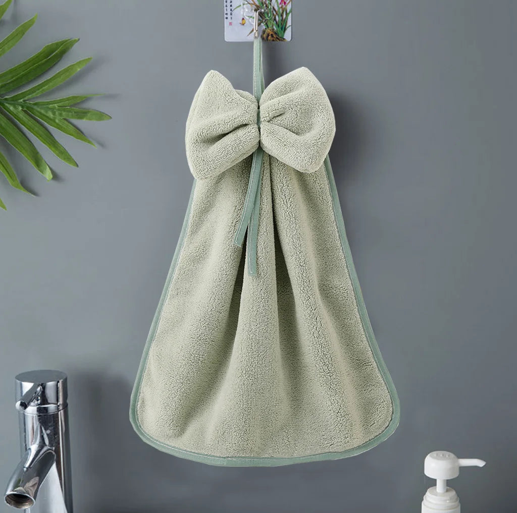 Coral velvet microfiber towel with bow charm accent, ultra-soft quick-dry design for kitchen and bath