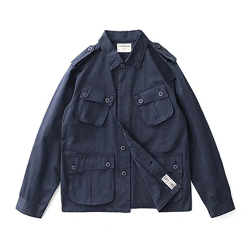 Men's olive green M43 vintage field jacket with military utility style and authentic shoulder epaulets